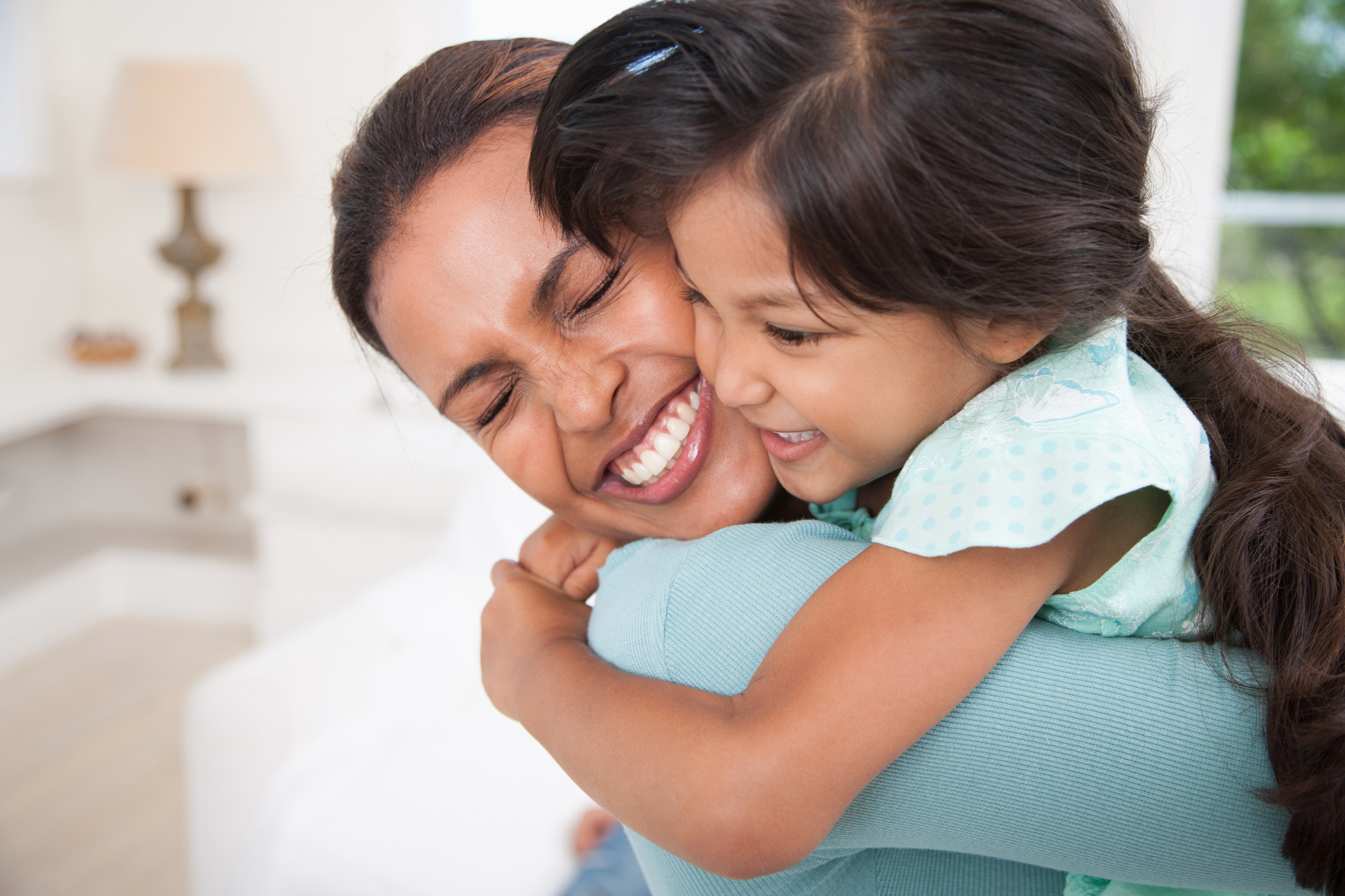 Stepmother daughter. Mother hugging. Mum and Happy child.